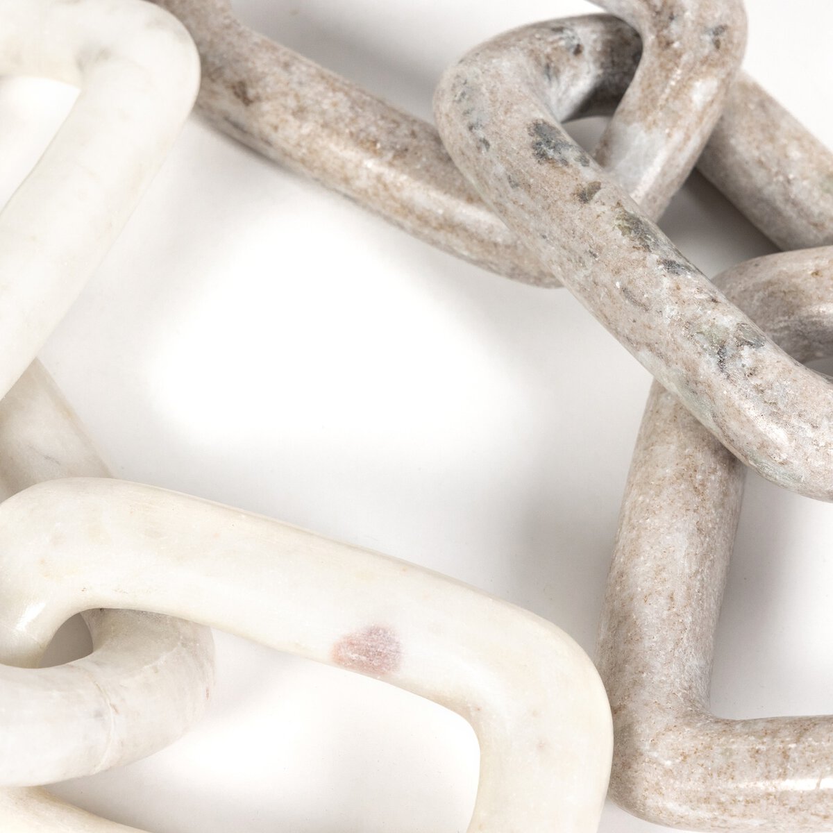 Detail of taupe and white marble chains