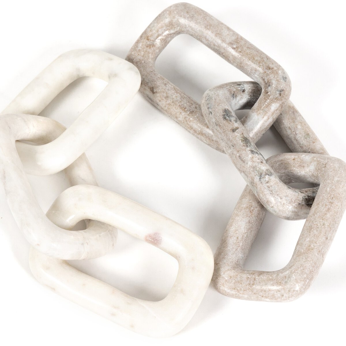 Overhead view of taupe and white marble chains